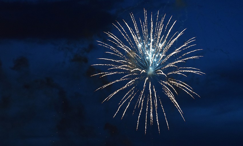 Fireworks illuminate the sky over Sarasota Bay.