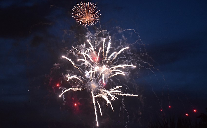 Fireworks illuminate the sky over Sarasota Bay.