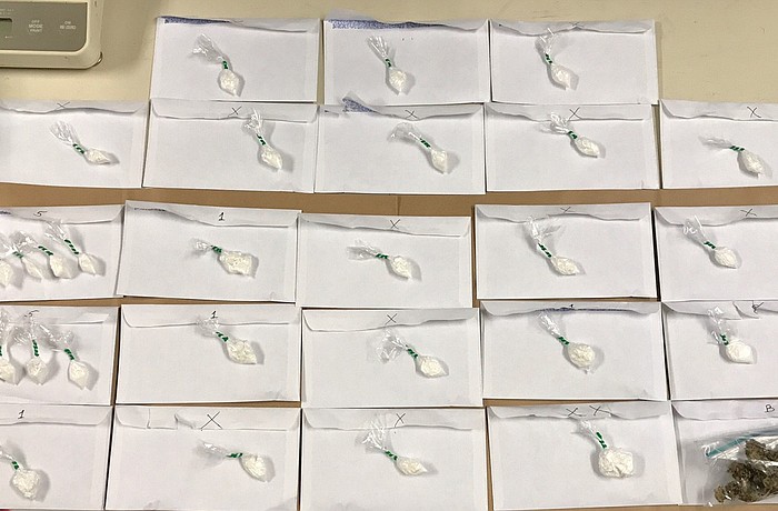 22 bags of cocaine were found in the vehicle, according to the Sheriff's Office, totaling almost 35 grams.