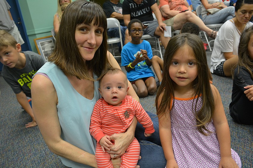 Andy Dpont, of Bradenton, got a first-row seat with her children, Novah, 3 months, and Isa, 2.