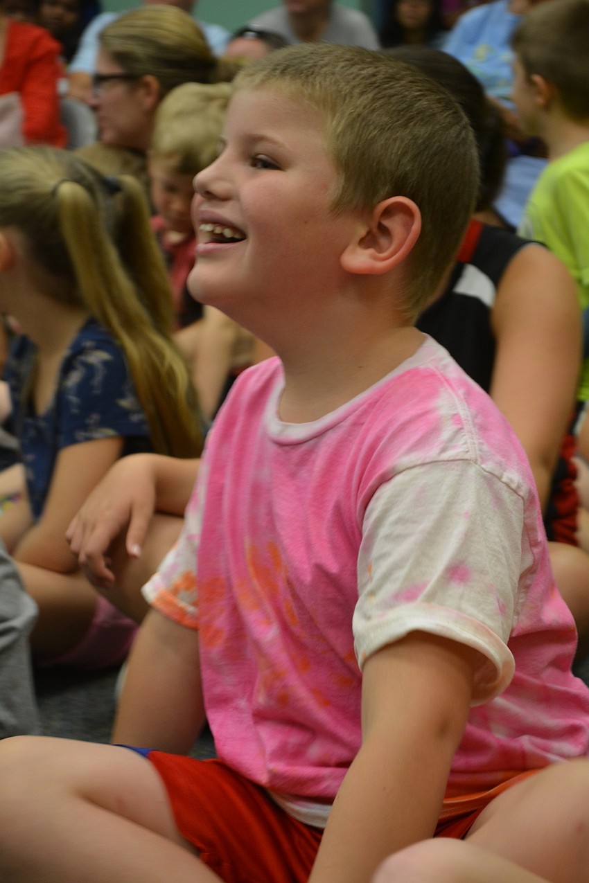 Braden River Elementary student Thomas Dunlop, 6, finds the presentation entertaining.