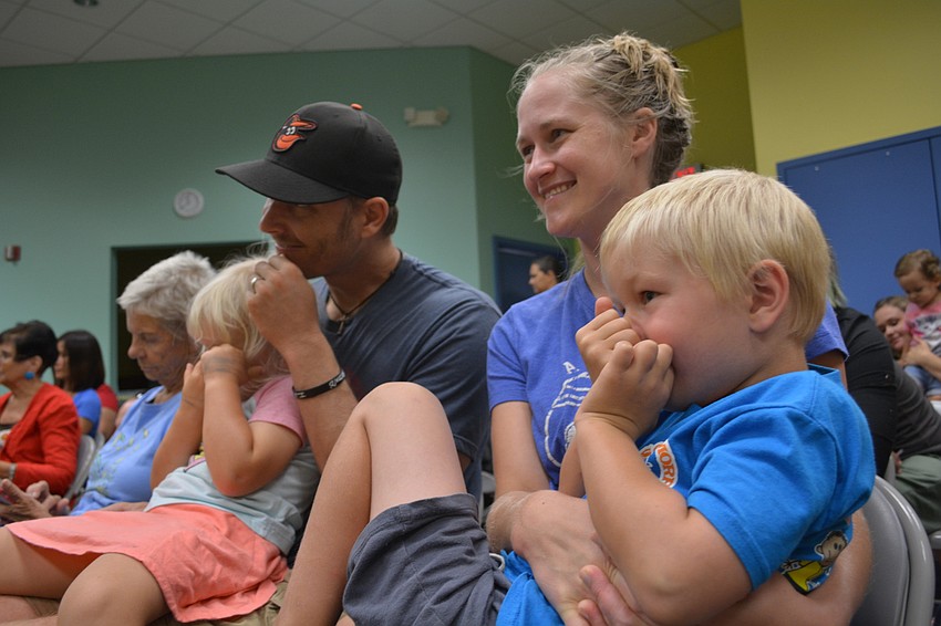 The Werner family enjoys the show. Pictured are parents Ryan and Amy with children, Autumn and Colton.