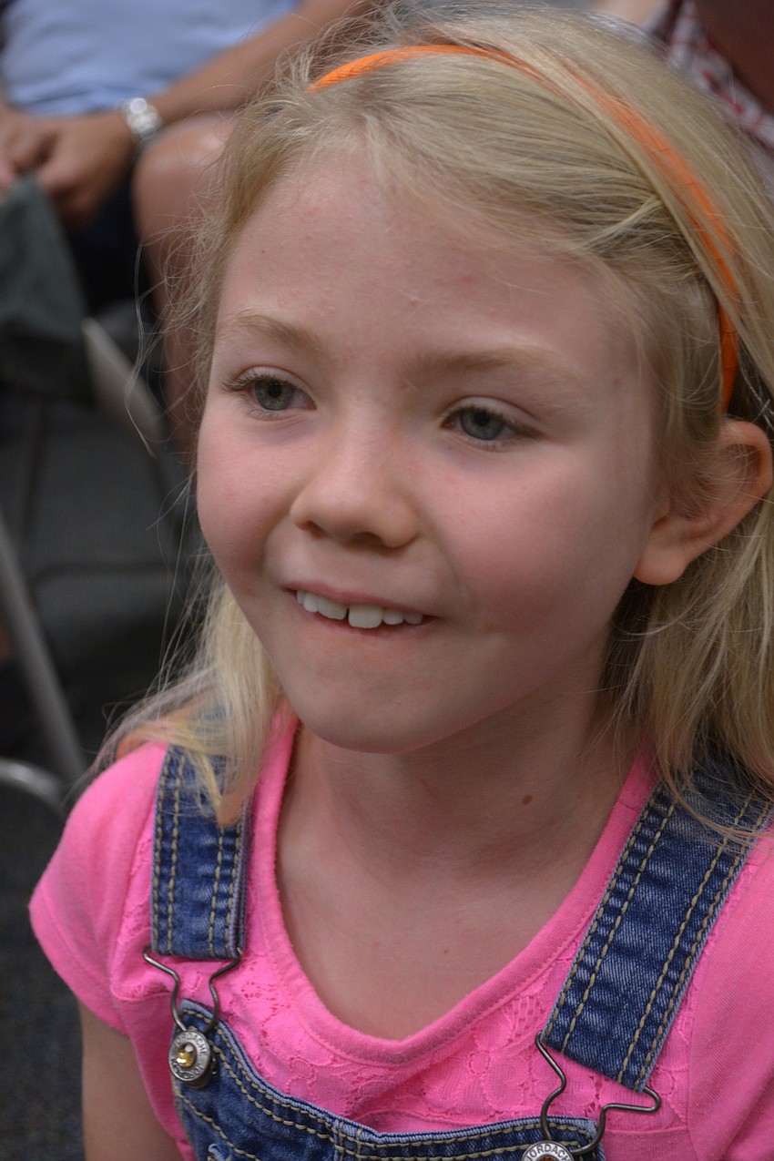 Felicity Graf, 6, is excited to see the alligator.