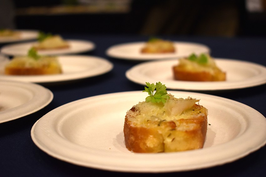 Indigenous served baked lionfish garlic toast.