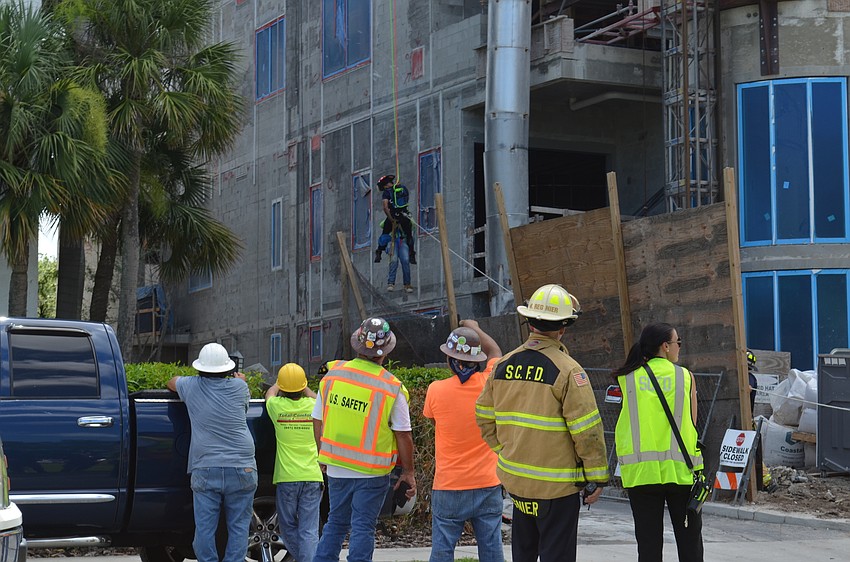 After the man was lowered to the ground, he was transported to the hospital for further evaluation, but no injuries were reported.