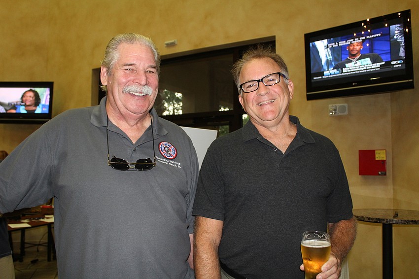 East County's Richie Evers and Garrett Lindgren mingle over a beer.