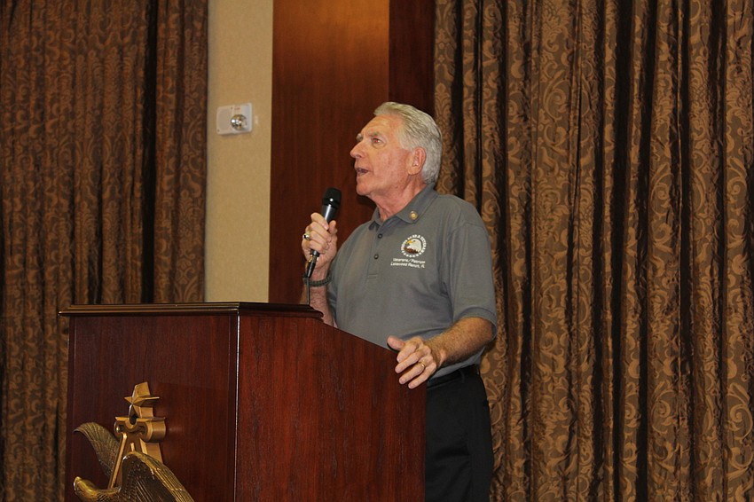 Gene Sweeney, the founder of Salt of the Earth USA, thanks attendees for supporting veterans.