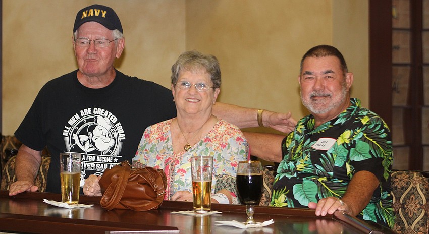 East County's Jim Grace, Sharon Miles and Jim Miles chat over drinks.