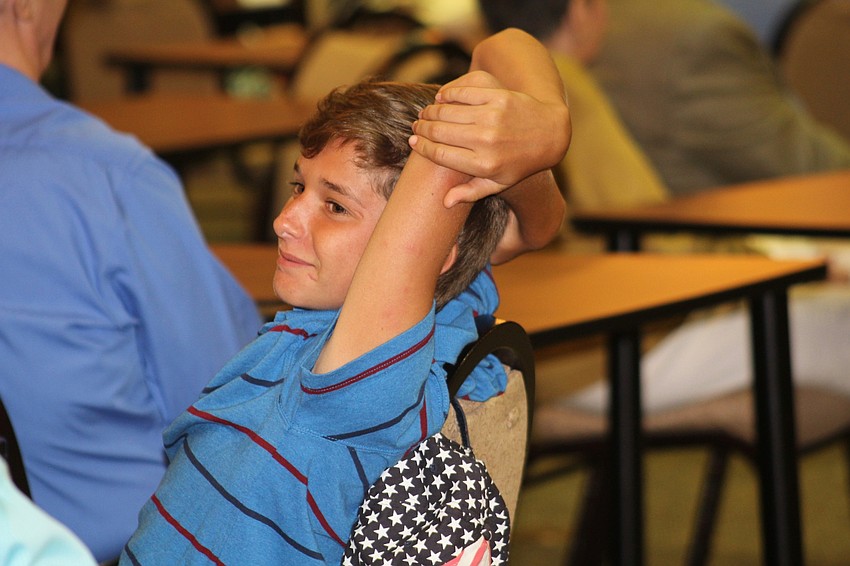 Palmetto's Dylan Huzzard takes in the comedy show.