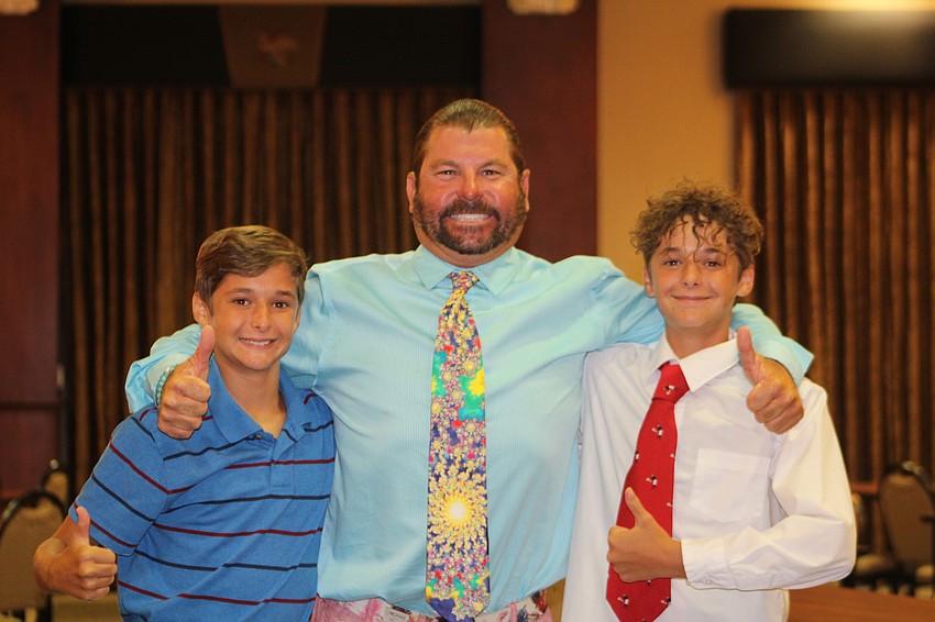 Palmetto's Dylan Huzzard, Calvin Cole and Jakob Huzzard get ready for the comedy show.