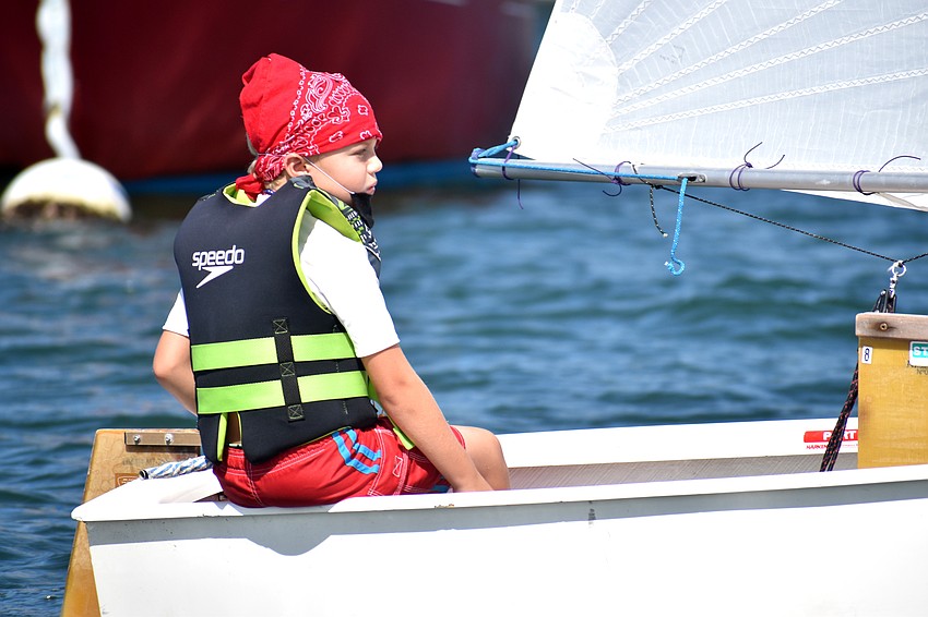Dylan Korn steers his sailboat toward the first clue of the treasure hunt.