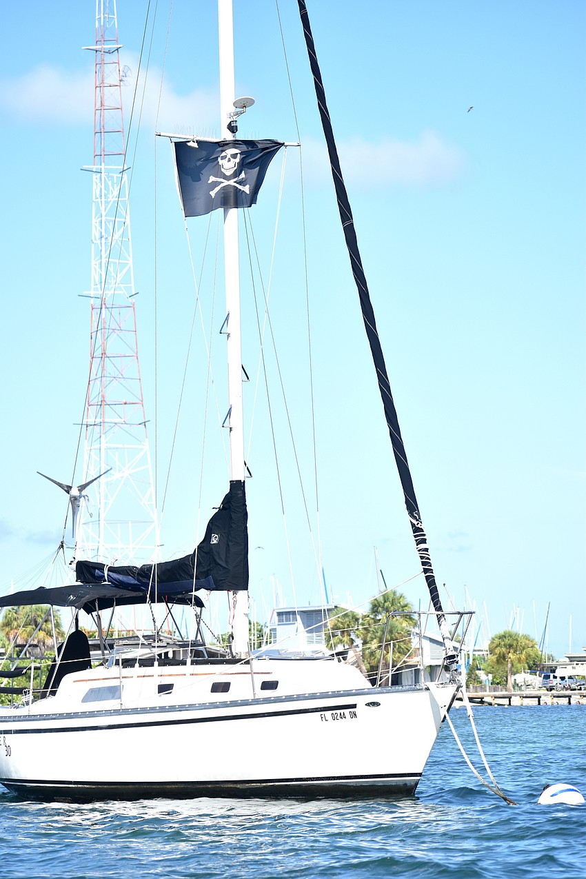 The first clue was on this boat marked with a pirate flag.