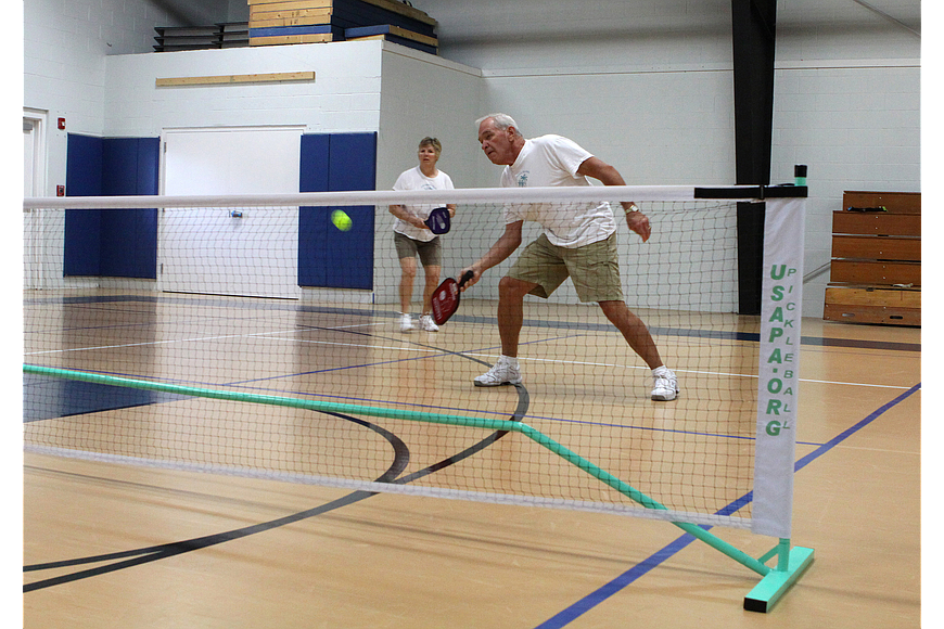 Bird Key Yacht Club is adding outdoor courts for pickleball, a fast-growing paddle sport.