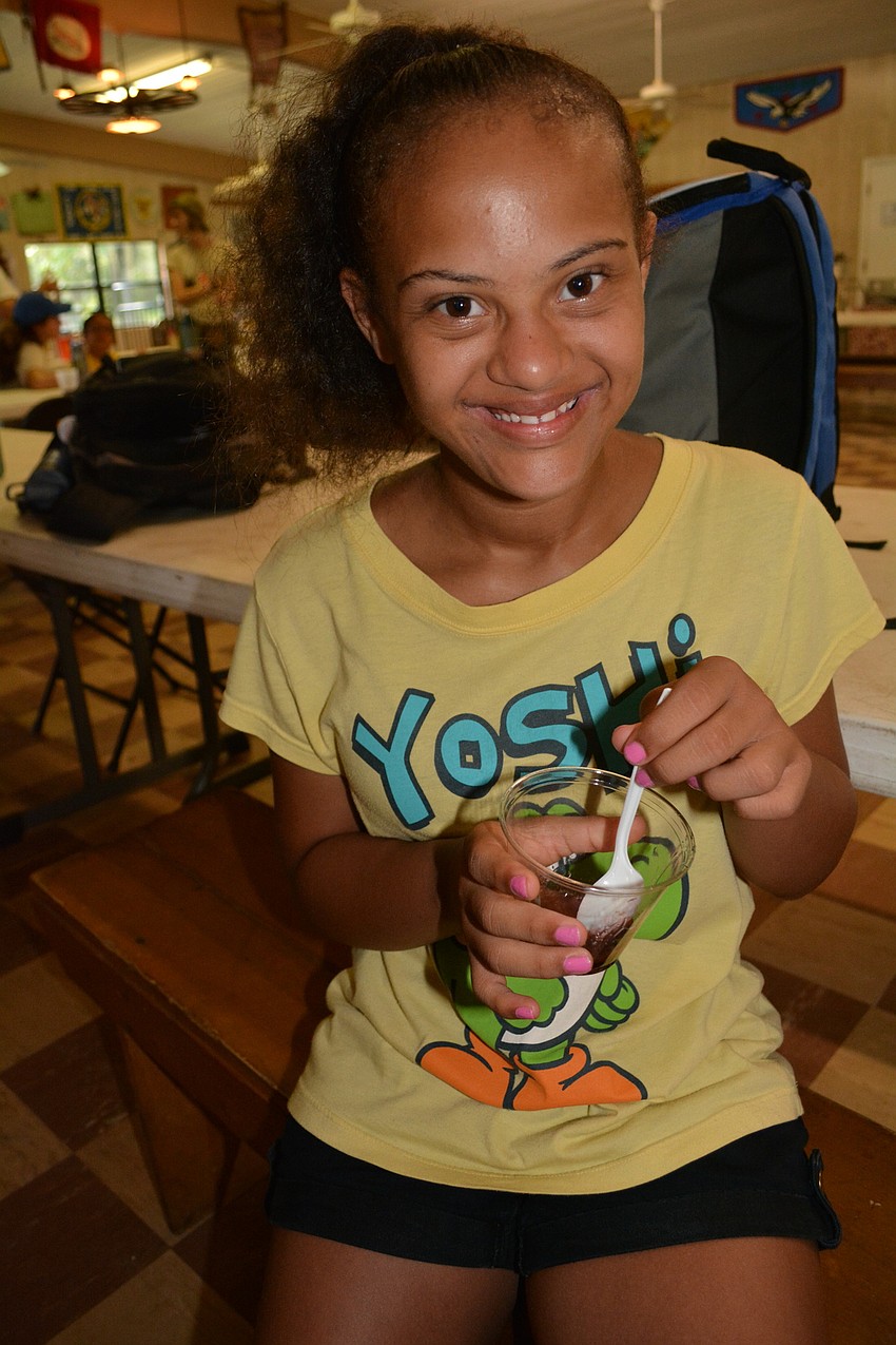 Nolan Middle School's Olivia Bryant, 13, makes a potion inspired by 