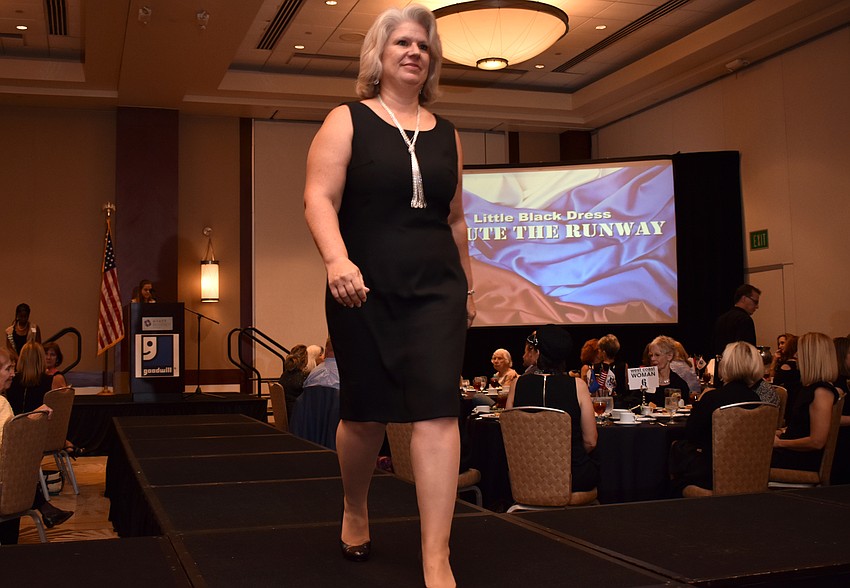 Delane Solana, U.S. Marine Corps veteran, shows off her Goodwill Manasota ensemble on the runway.