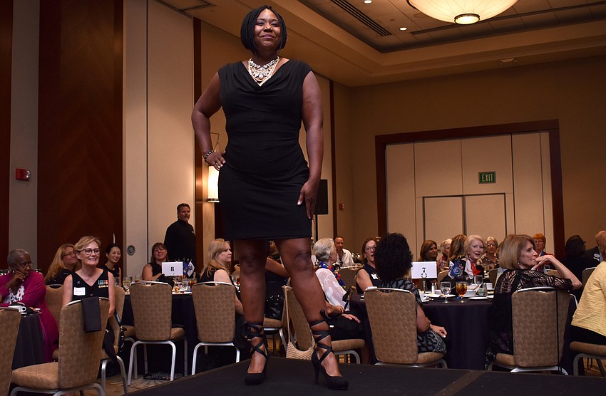 Natasha Burton, U.S. Air Force veteran, strikes a pose on the runway.