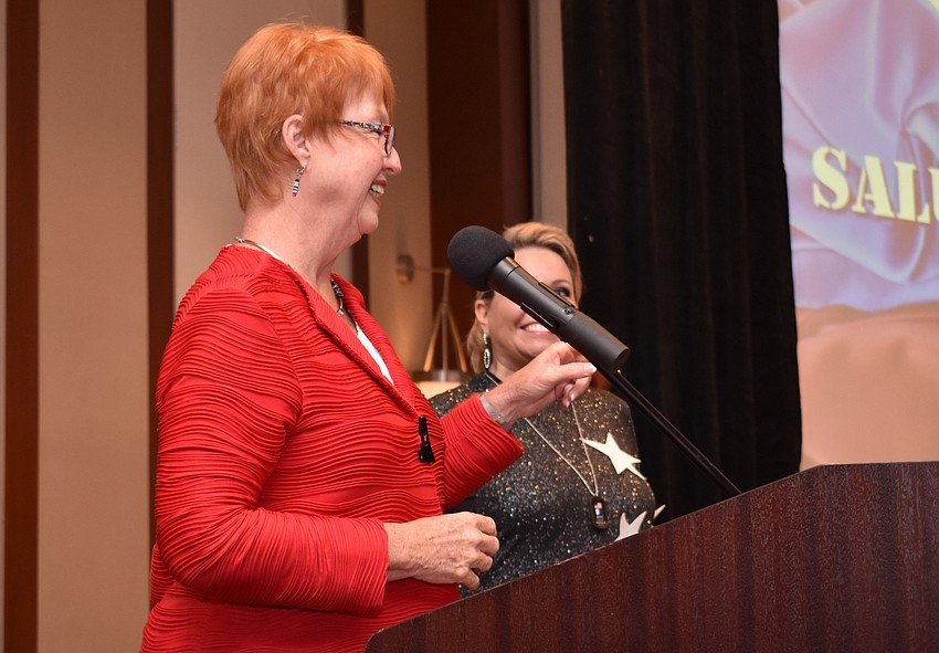 CEO of Girl Scouts of Gulfcoast Florida Mary Anne Servian laughs as she welcomes guests.