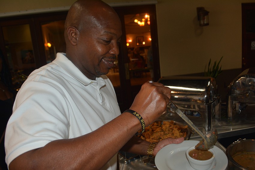 Lucius Bonner of East County serves himself some gumbo. It was his third year at the event.