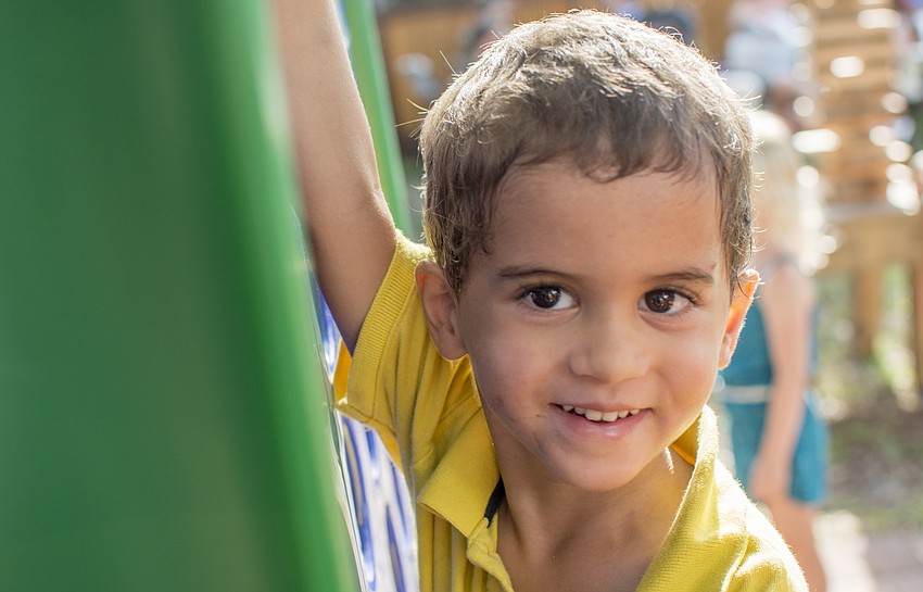 Peter Jacob plays giant tic-tac-toe during the JDub's one-year anniversary food truck rally.