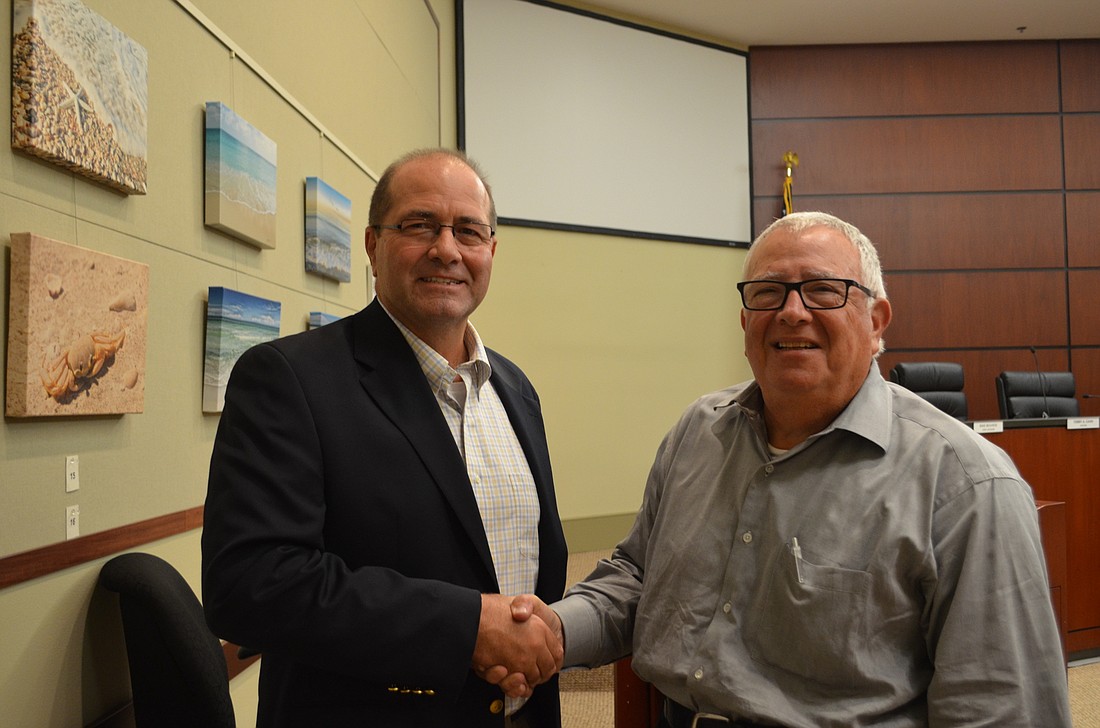Future Longboat Key Town Manager Tom Harmer and Mayor Terry Gans after Monday&#39;s meeting.
