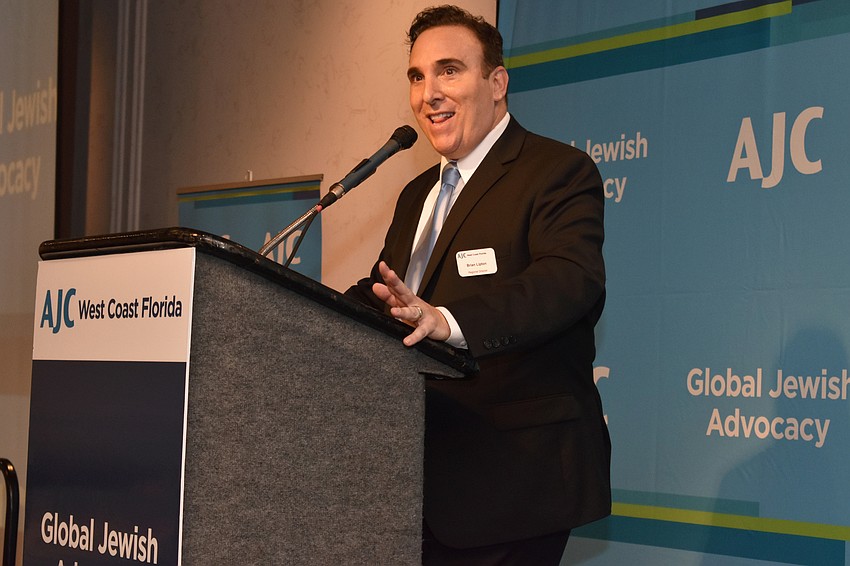AJC Regional Director, West Coast Florida Brian Lipton welcomes the crowd to the first of three talks in the AJC 2017 Summer Lunch & Learn Series on July 19 at Michael’s On East.