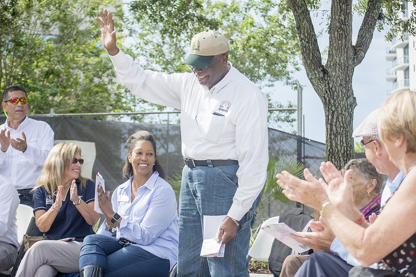 City Commissioner and former mayor Willie Shaw stands to be recognized at the park's rededication.