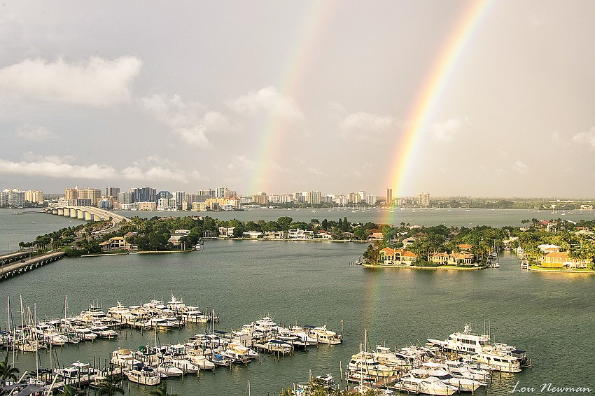 June winner: Lou Newman captured this photo of rainbows over Sarasota from the 19th floor of Plymouth Harbor on Sarasota Bay.