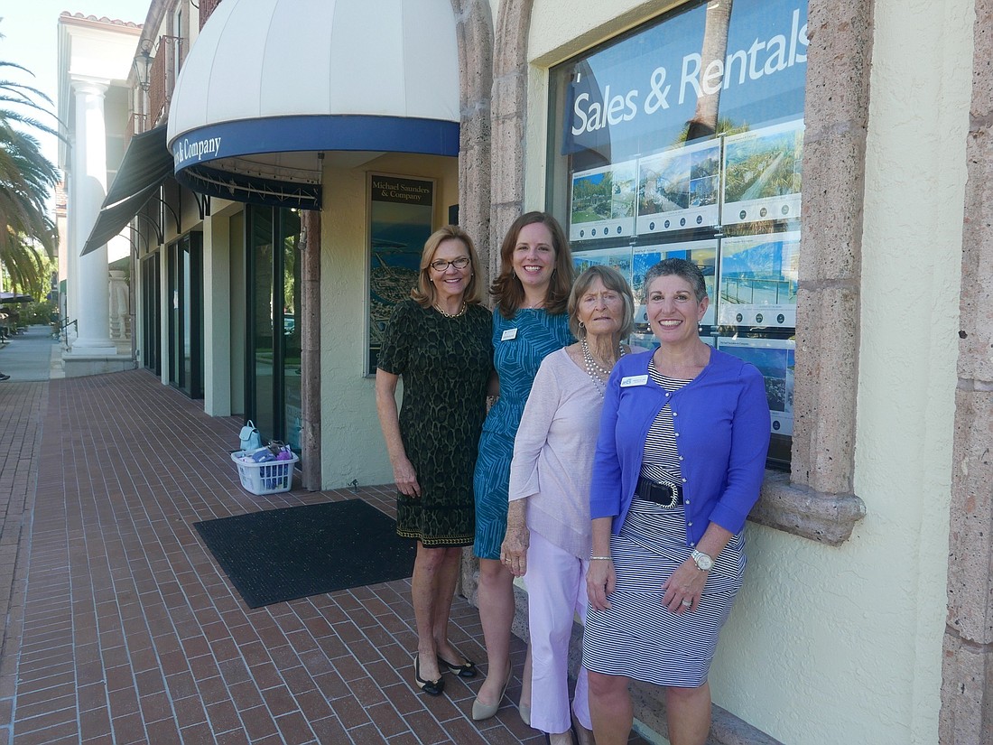 MSC realtor Julie McClung (left) stands alongside Red Cross Major Gifts Officer Kristin Burke (second from left), MSC realtor Bobbie Bannan (second from right) and Jewish Family & Childrenâ€™s Services CEO Heidi Brown.