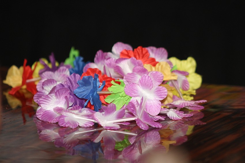 The Cheers for Charity event carries a tropical theme.