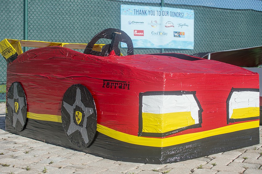 Intertape Polymer Group donated resources and time to help members construct their own boats.