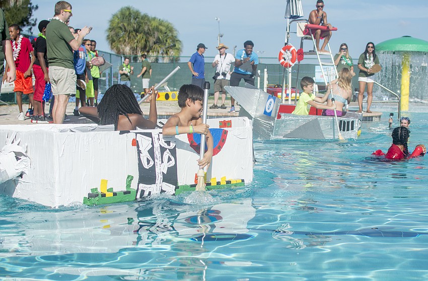 Contestants face off against each other in the  inaugural Rock the Boat Regatta that the Boys and Girls Club.