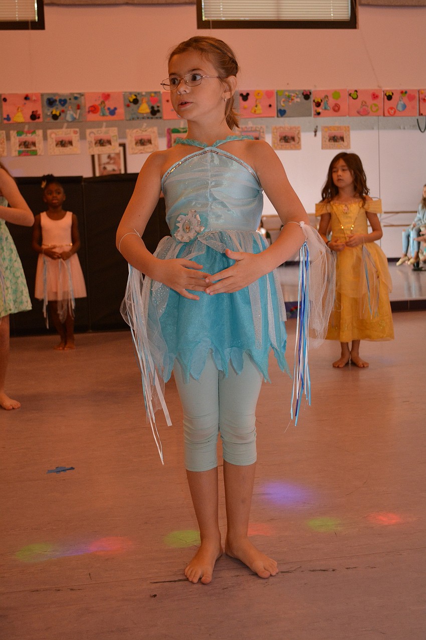 Addyson Kotlarczyk starts the performance with a dance to a song from 