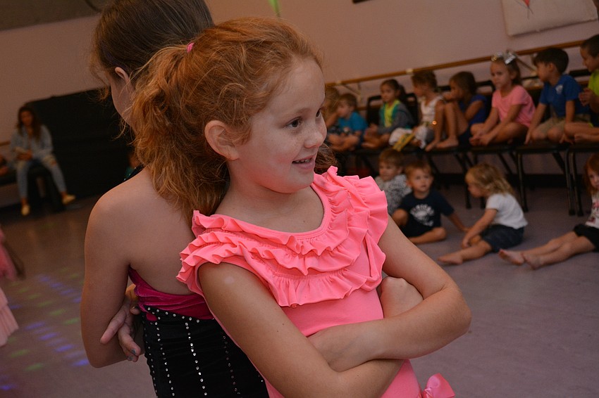 Kenadee Boggs is all smiles at the end of the song and dance to 