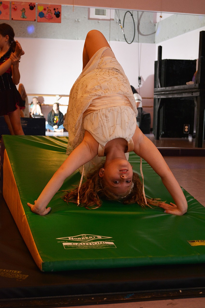Rachel Gocinski shows off her acrobatics during the show's finale.