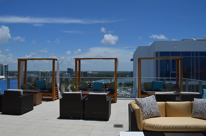 Couches and chairs dot the rooftop bar area at The Westin Sarasota.