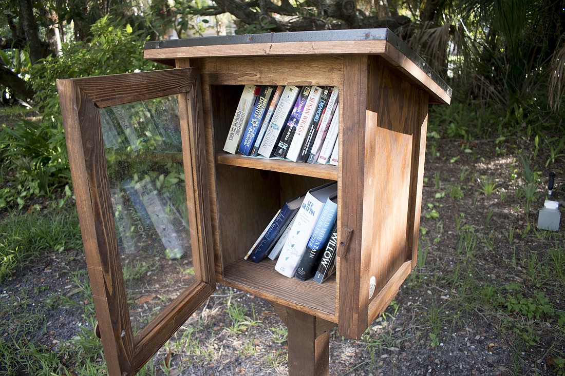 This Little Free Library box is located at Bicentennial Park. Another one is located at Bayfront Park.