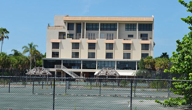 The Colony Resort stands in tatters.