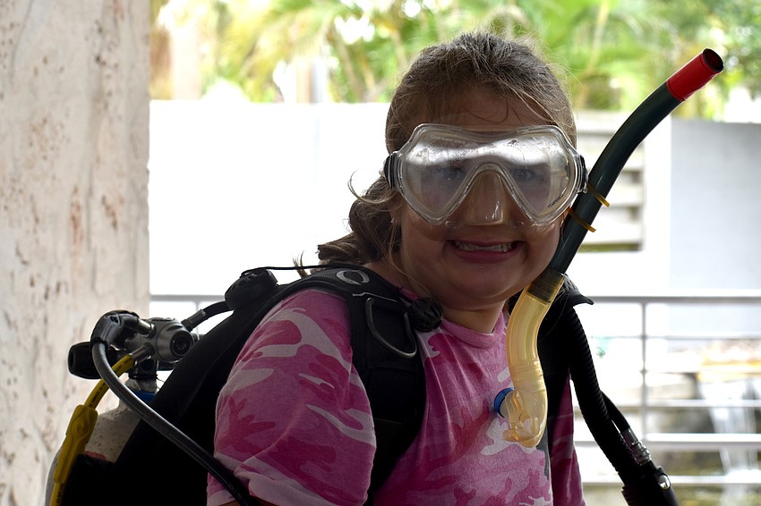 Mikayla Kelly models the scuba gear she tried on.