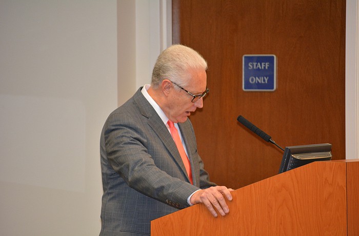 Manatee County Attorney Mickey Palmer reads a prepared statement.