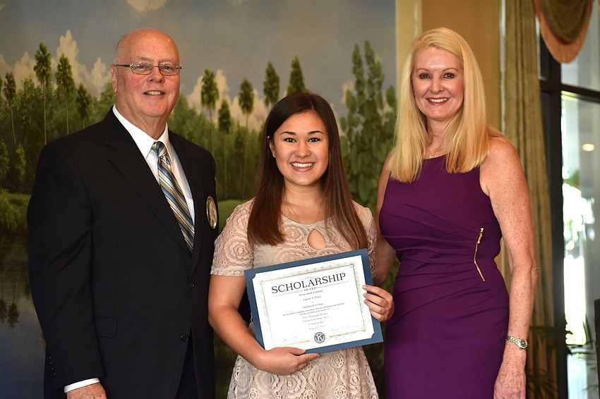 Kiwanis Club of Longboat Key Foundation President Joe Walsh, Angela Potier and Scholarship Committee Chairwoman Susan Phillips
