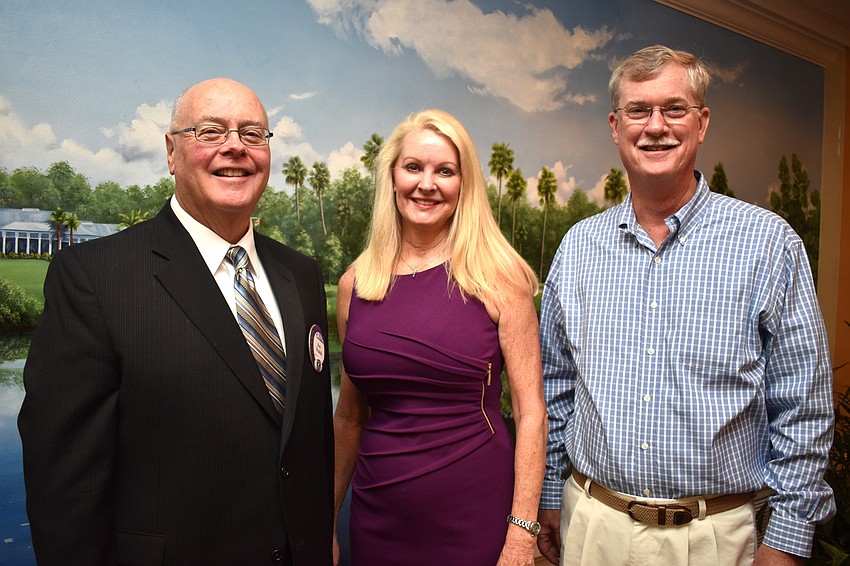 Kiwanis Club of Longboat Key Foundation President Joe Walsh, Scholarship Committee Chairwoman Susan Phillips and club President Steven Branham