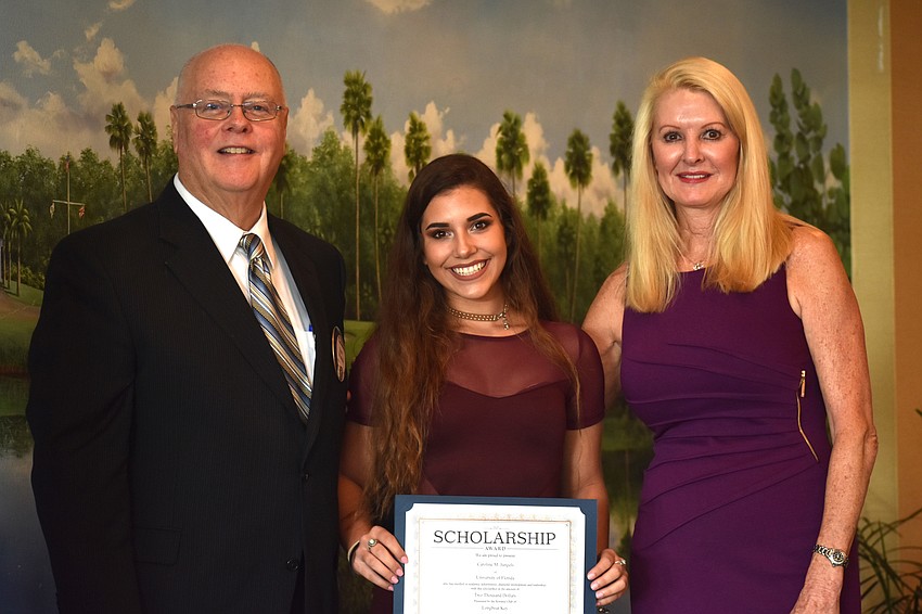 Kiwanis Club of Longboat Key Foundation President Joe Walsh, Caroline Jungels and Scholarship Committee Chairwoman Susan Phillips