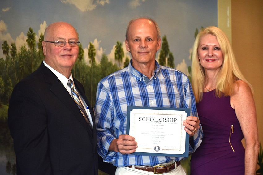 Kiwanis Club of Longboat Key Foundation President Joe Walsh,Mark Keckstein, who accepted the scholarship on his daughter’s behalf, and Scholarship Committee Chairwoman Susan Phillips