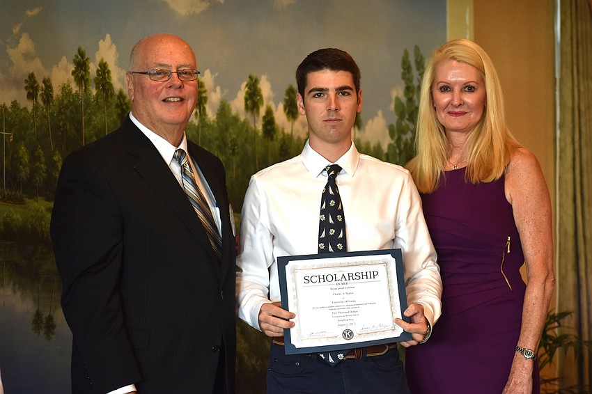 Kiwanis Club of Longboat Key Foundation President Joe Walsh, Charles Martin and Scholarship Committee Chairwoman Susan Phillips