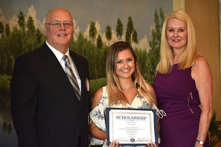Kiwanis Club of Longboat Key Foundation President Joe Walsh, Monica Olender and Scholarship Committee Chairwoman Susan Phillips