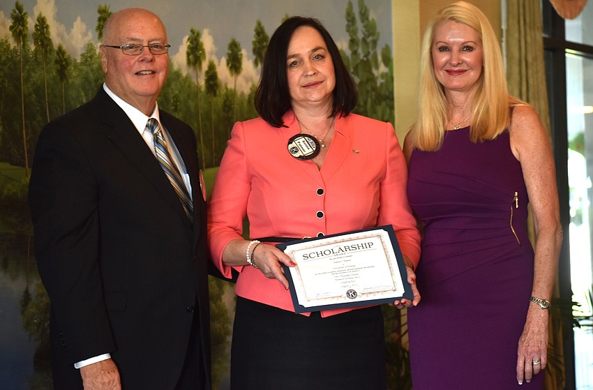 Kiwanis Club of Longboat Key Foundation President Joe Walsh, Asima Palmer, who accepted a scholarship on her daughter’s behalf, and Scholarship Committee Chairwoman Susan Phillips