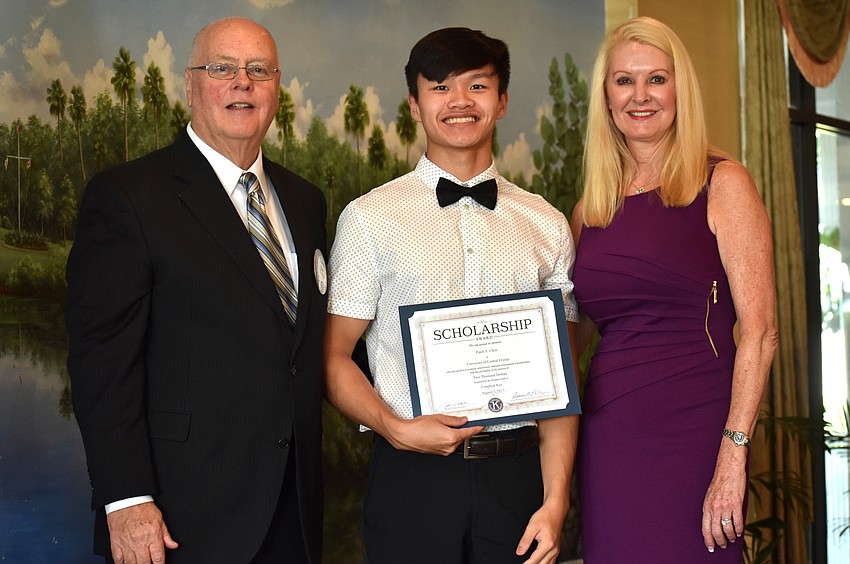 Kiwanis Club of Longboat Key Foundation President Joe Walsh, Patch Chen and Scholarship Committee Chairwoman Susan Phillips