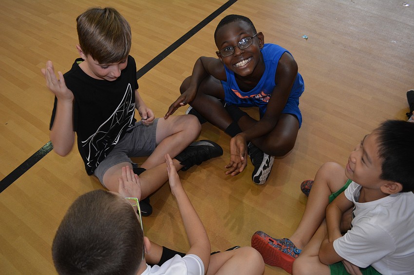 Finn Deleo, 9, and Christopher Holmes, 10, play 