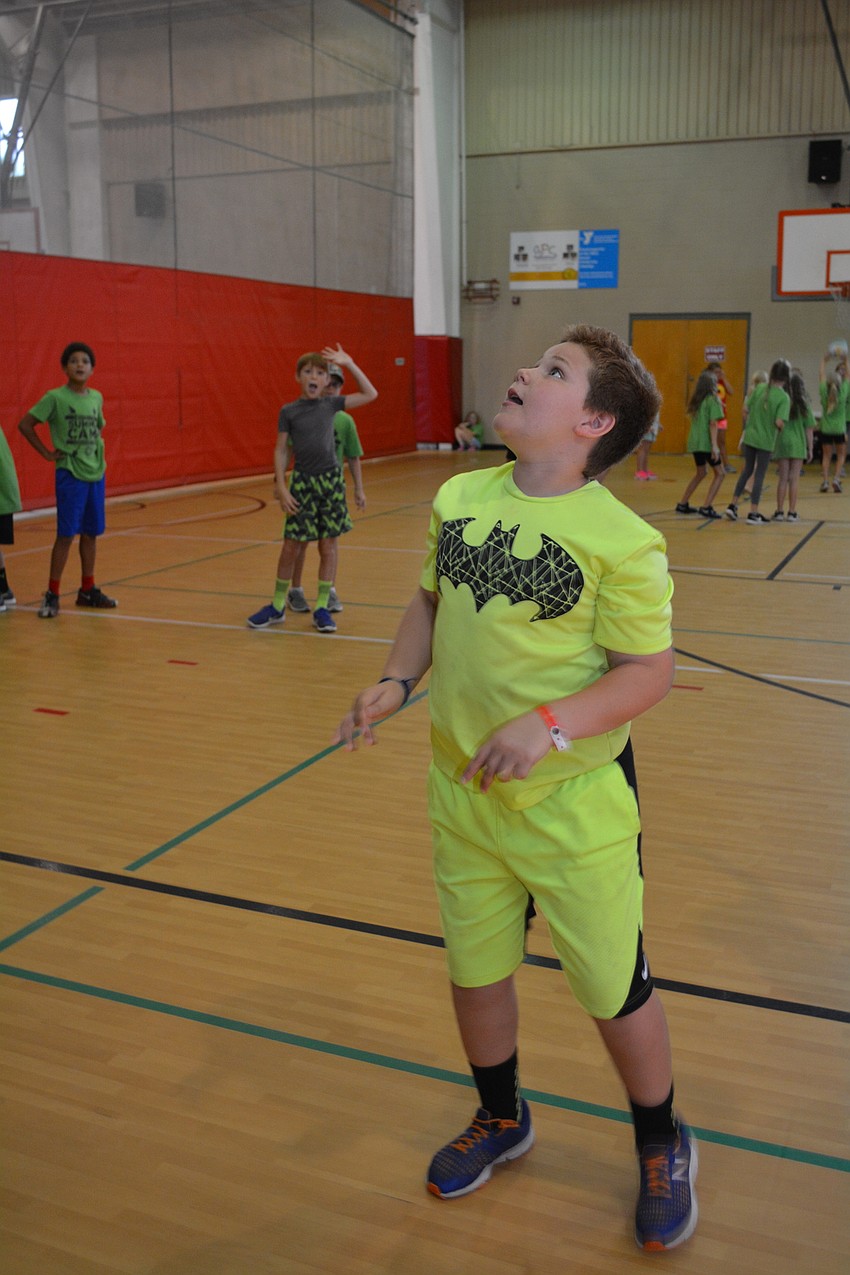 Austin Glessing, 9, is one of the last players left in a basketball game called 