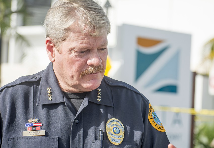 Longboat Chief Pete Cumming stands outside Zota Beach Resort. The resort was the scene of a double homicide on Aug. 4.